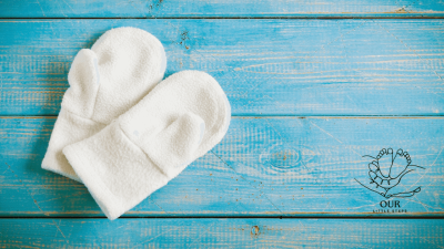 Infant sleeping safely in a crib to prevent Sudden Infant Death Syndrome (SIDS)